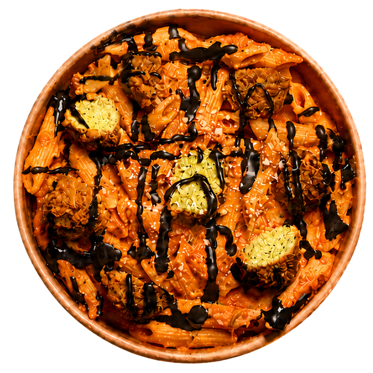 Pasta Falafel: penne in romige tomatensaus met knapperige falafel en zwarte knoflooksaus